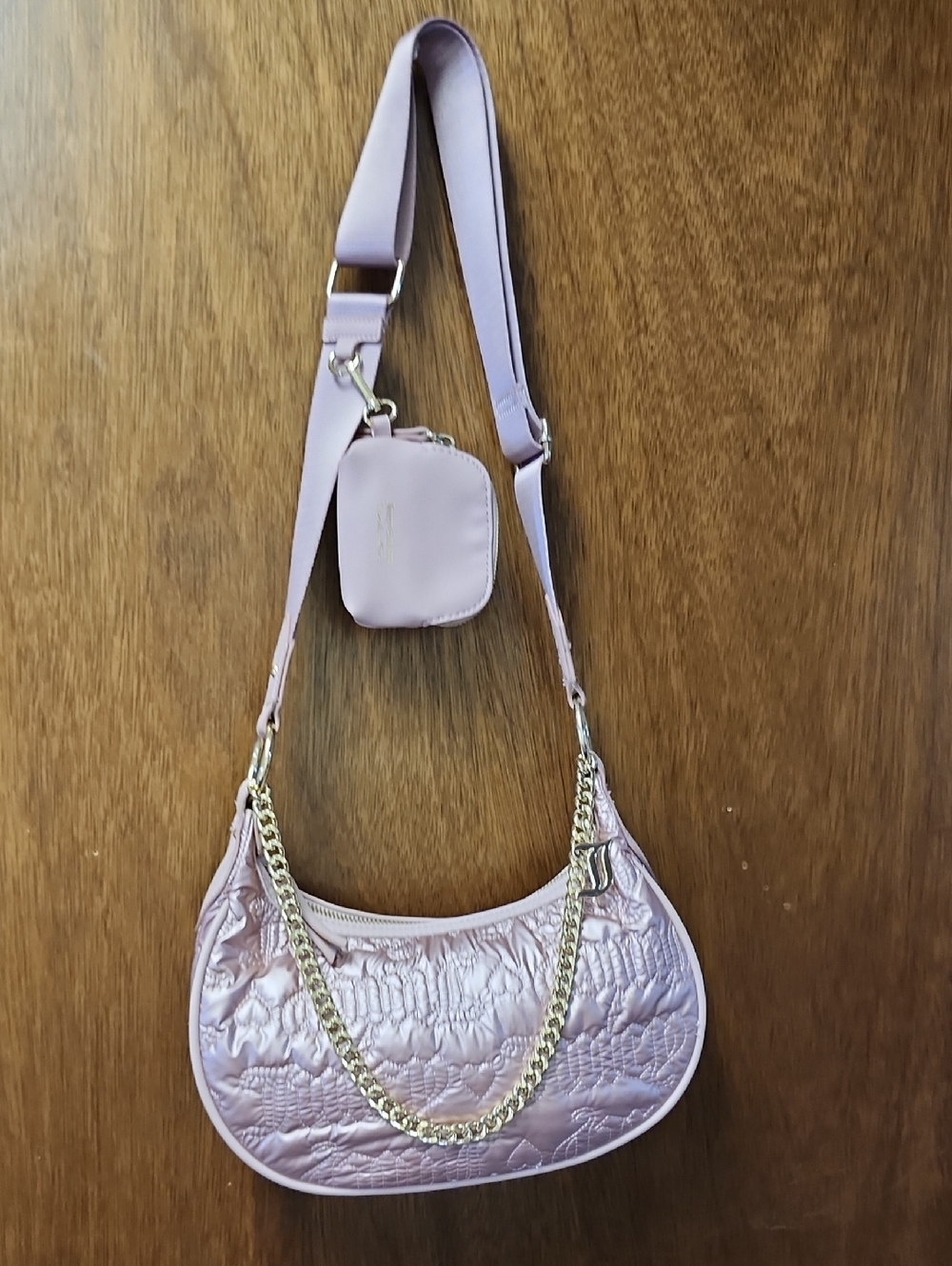 Juicy Couture Puff Half Moon Crossbody Bag With Coin Purse
 color "Dusty Blush